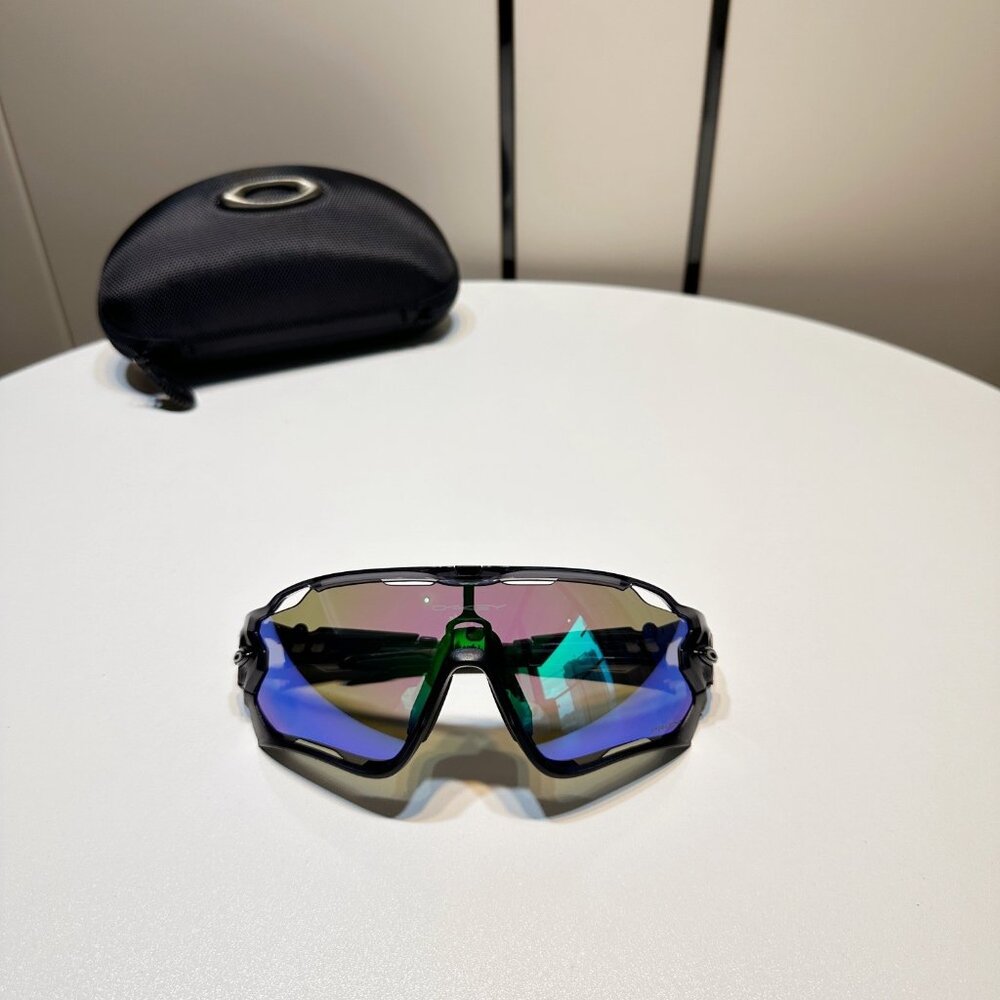 Oakley Sunglasses with Black Frame and Multicolor Lenses